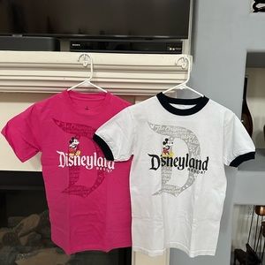 2 Disney shirt washed never used